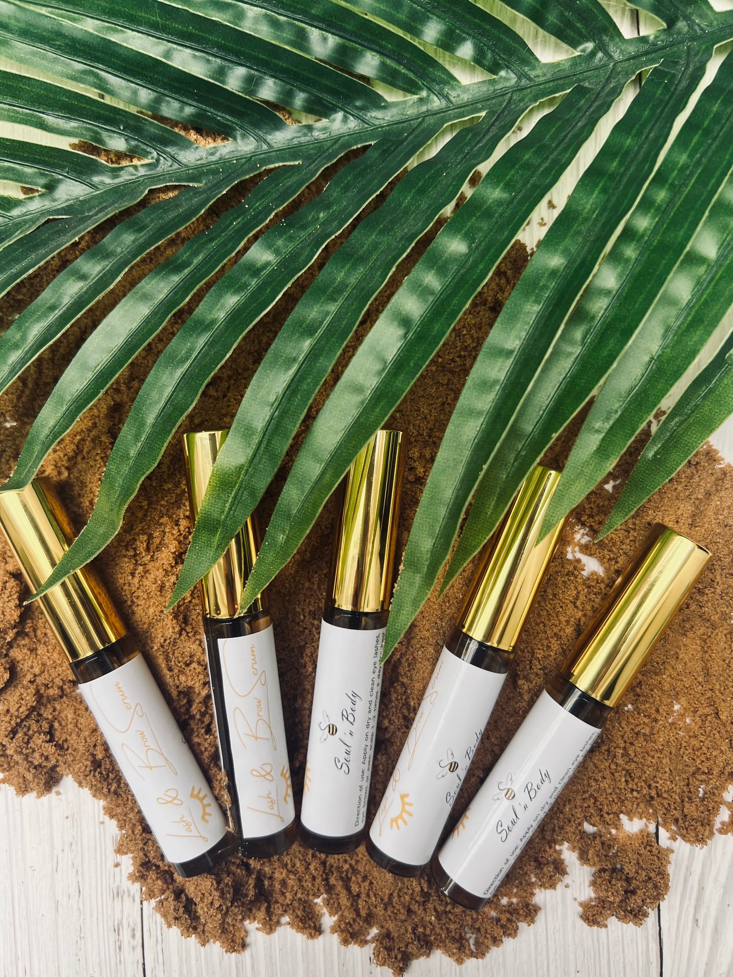 Black castor and almond oil lash and brow serum to promote thicker, healthier hair.