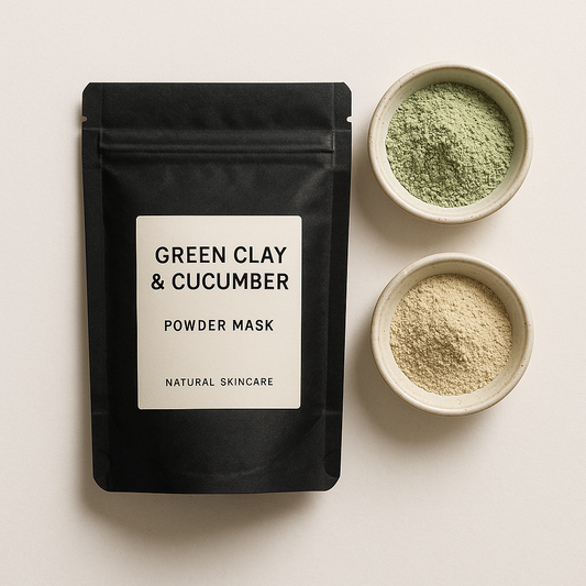 Green Clay & Cucumber Powder face mask in eco-friendly packaging, shown alongside small bowls of powder and clay for a natural skincare display.