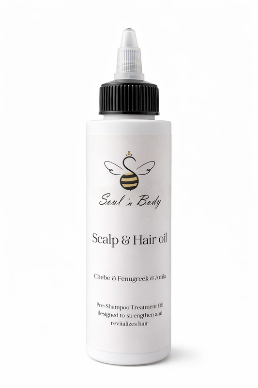 Bottle of Soul n Body Scalp & Hair Oil with chebe, fenugreek, and amla on a white background