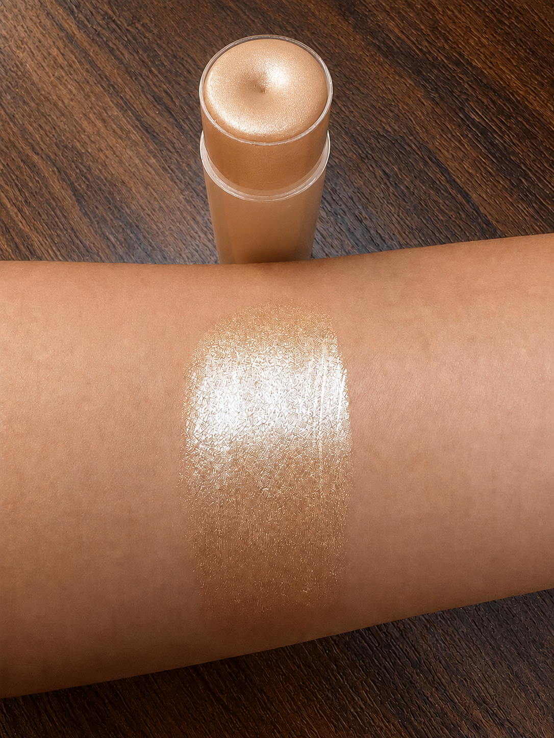 Golden Hour limited edition tinted lip balm swatch on arm showing warm golden shimmer finish – handmade natural lip balm by Soul n Body