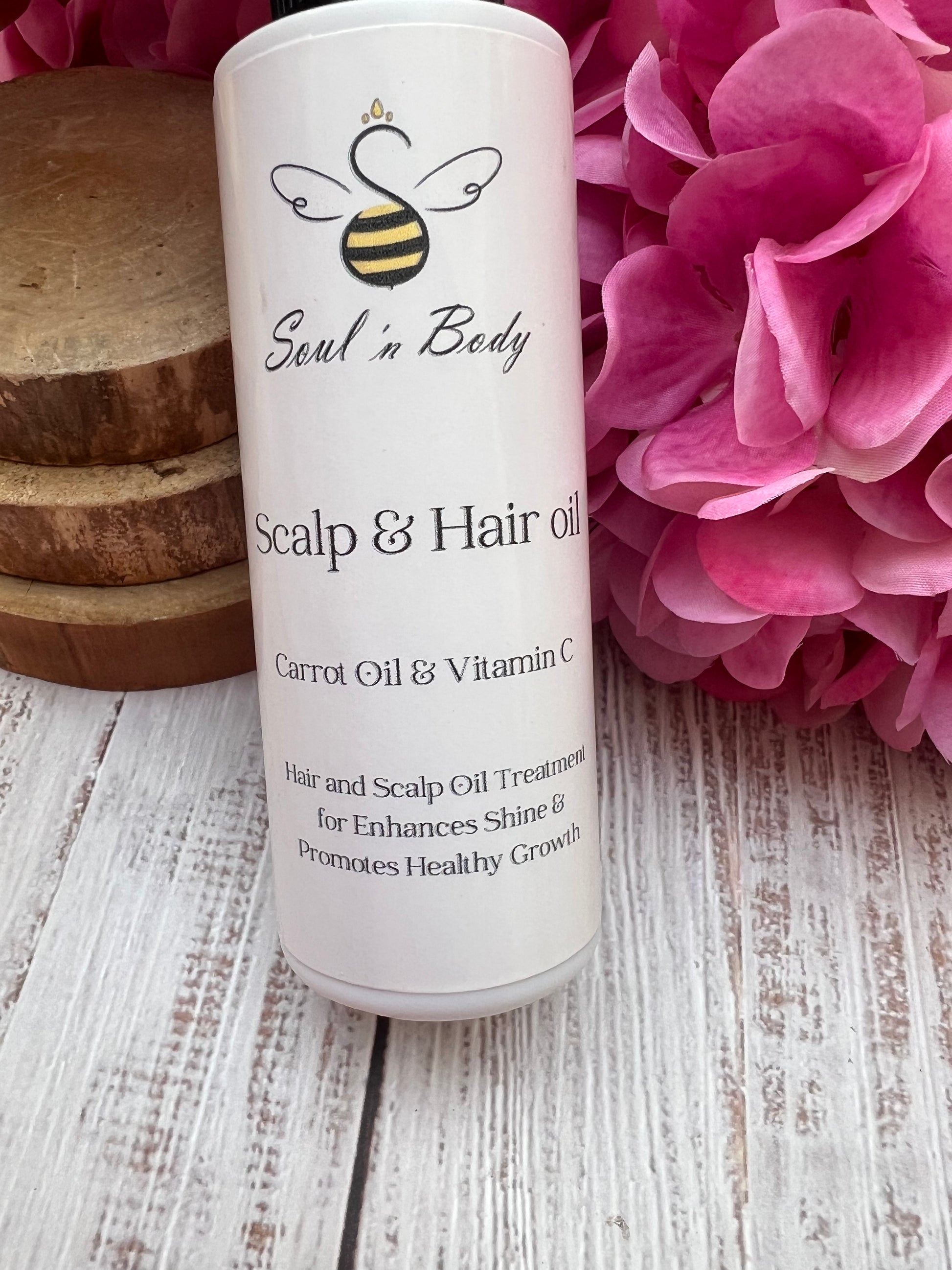 Hair treated with carrot and vitamin C oil for smoother, glossier strands