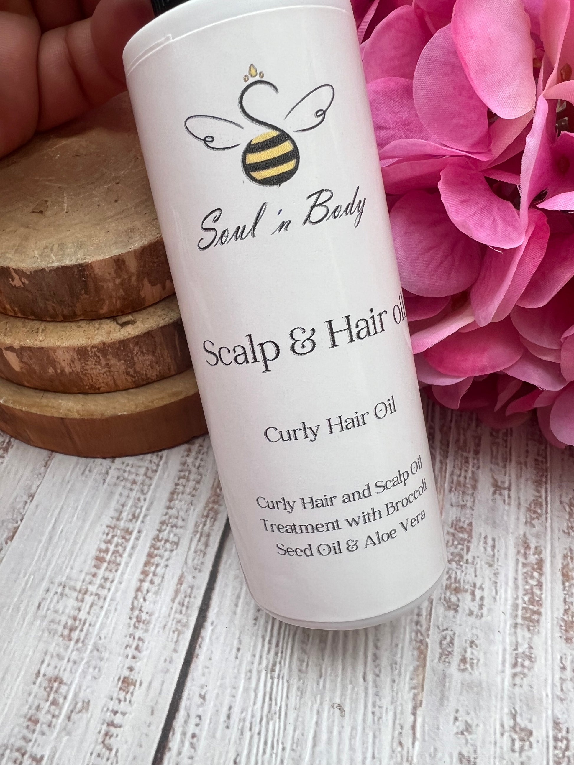 Broccoli seed and aloe vera hair oil for curly hair care routine