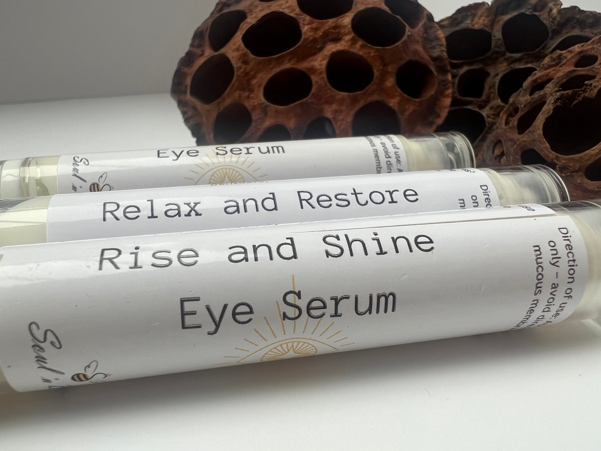 Natural day and night eye cream tubes labelled Relax and Restore, Rise and Shine – handmade vegan skincare