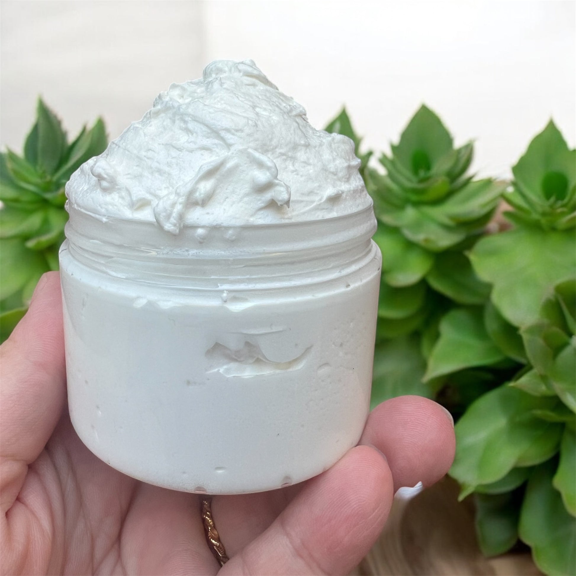 Toddler-safe whipped body cream with plant decor